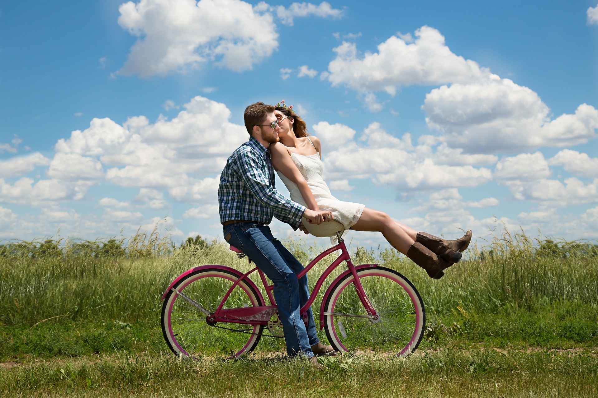 Couple in love riding a bike
